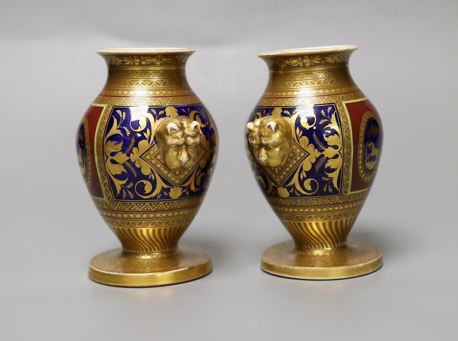 A pair of Paris porcelain two handled vases, first half 19th century, 12cm